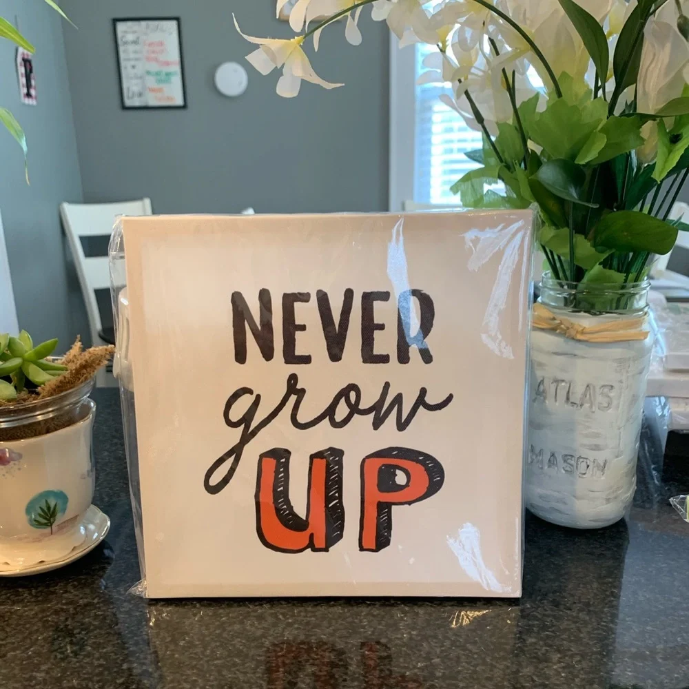 NEVER GROW UP canvas wall art - Picture 1 of 2
